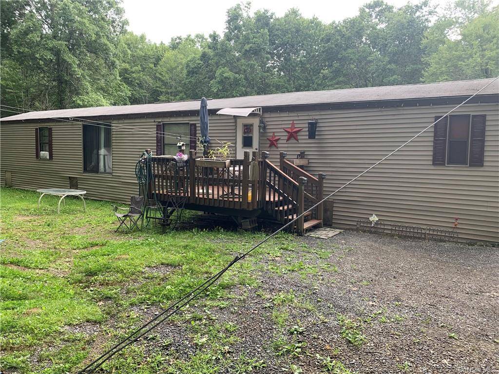 3 bedroom 2 bathroom manufactured home on a quiet cul de sac with over a half acre of land.