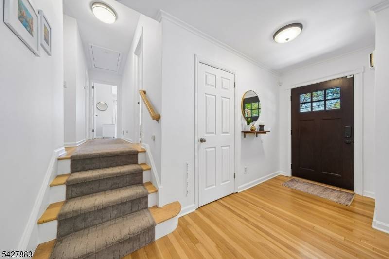 A true turn key home in the desirable Redwood section of West Orange refinished hardwood floors, walls painted in neutral, inviting tones, and generously sized rooms and closets.
