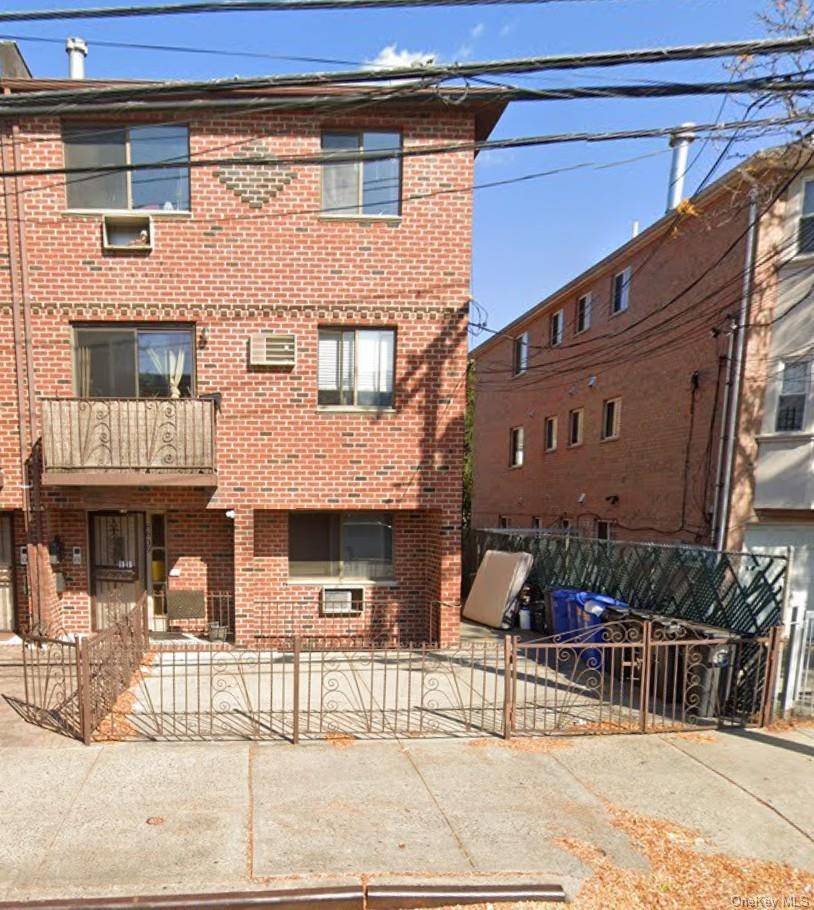 This residential income triplex in Ozone Park, Queens offers a total of 10 bedrooms and 6 full bathrooms across three units.
