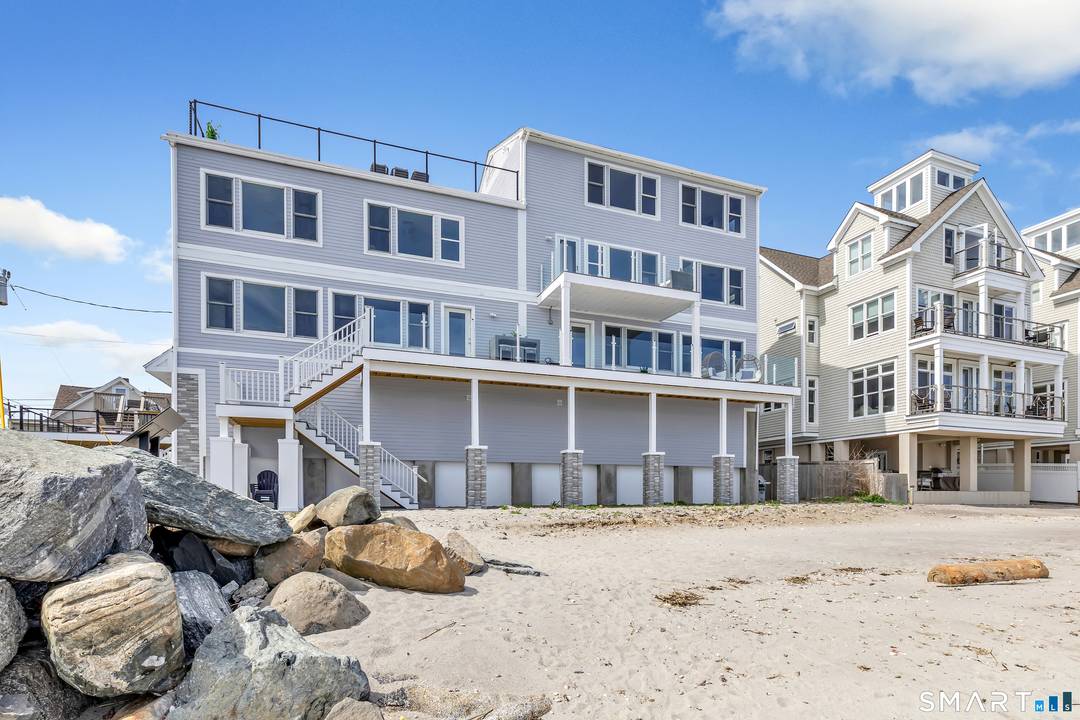 Beachfront Luxury with Panoramic Water Views !