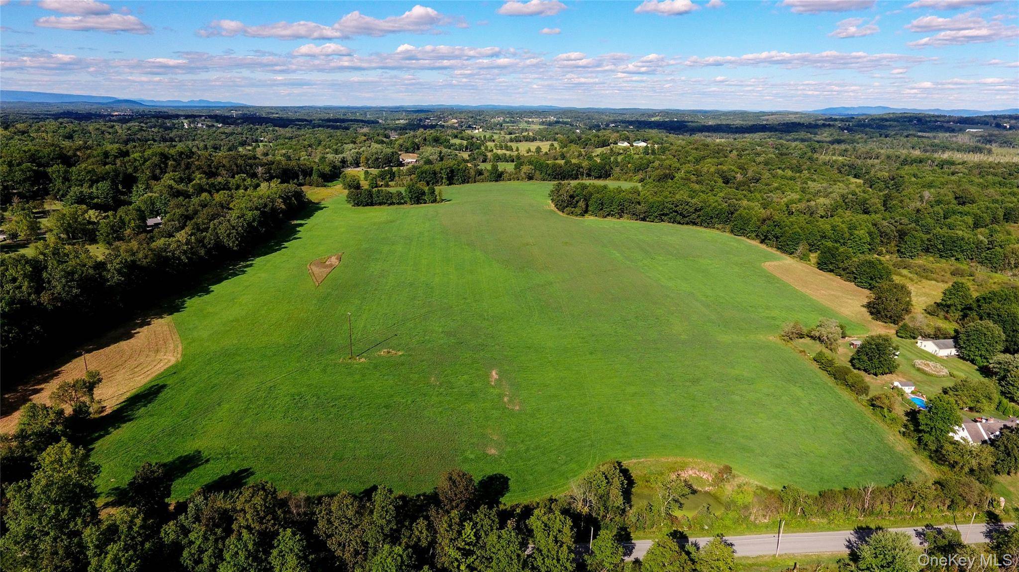 Incredible opportunity to own a beautiful, level, and cleared parcel in the Town of Goshen, offering approximately 1, 800 feet of road frontage on Coleman Road and an additional 497 ...