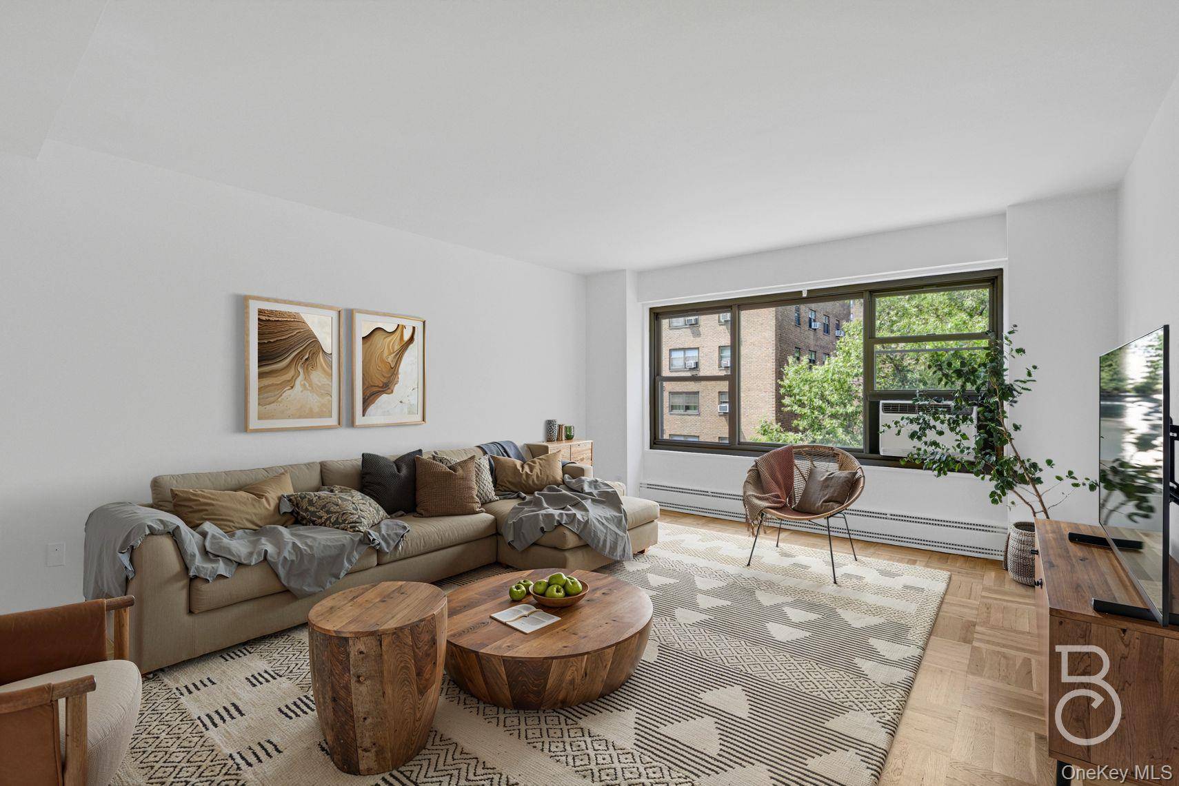 This spacious two bedroom home offers sweeping views of the beautifully landscaped grounds at Queensview, a well managed cooperative community of 14 buildings.