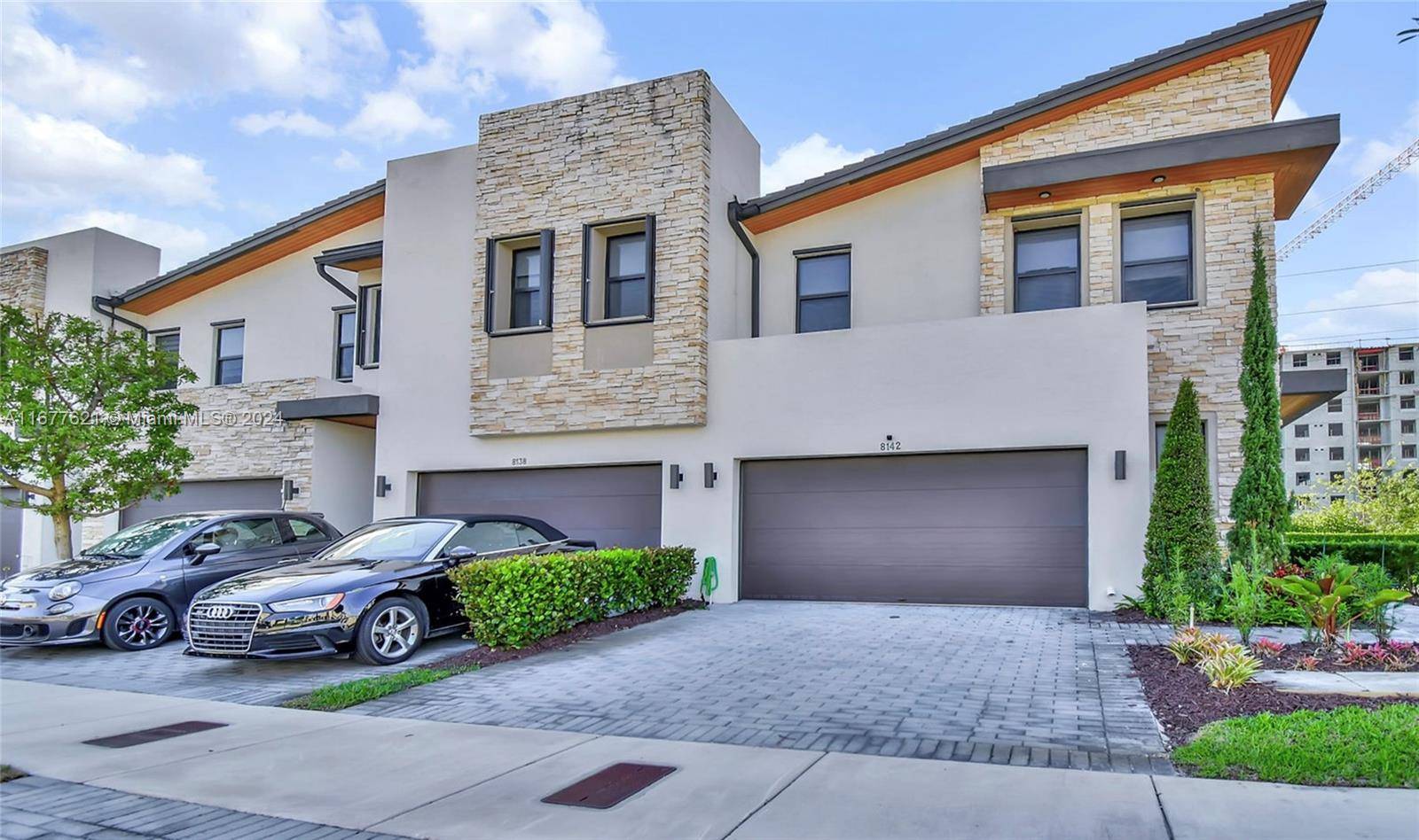 Beautiful corner townhouse located in a gated community, featuring 3 bedrooms and 2.