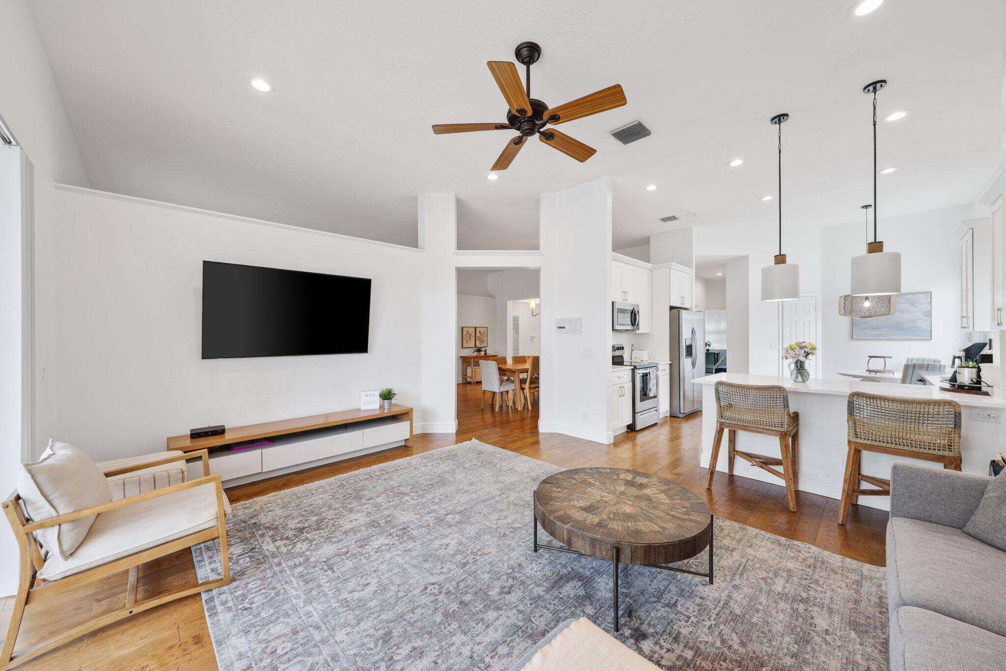 Welcome to this beautiful home located in the highly sought after Boca Falls community, where luxury meets convenience.