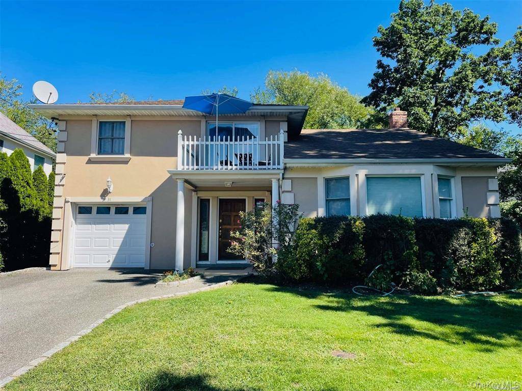 Set on a beautifully landscaped, park like property, this large split level home offers a spacious and comfortable layout.