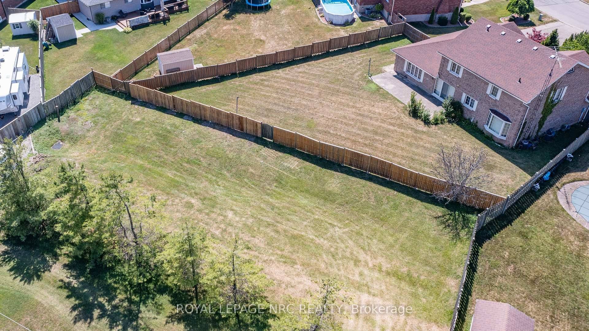 Welcome to 3 Elmvale. This beautiful family home sits on a nice pool sized pie shaped lot with NO rear neighbours, in a great north Port Colborne location.