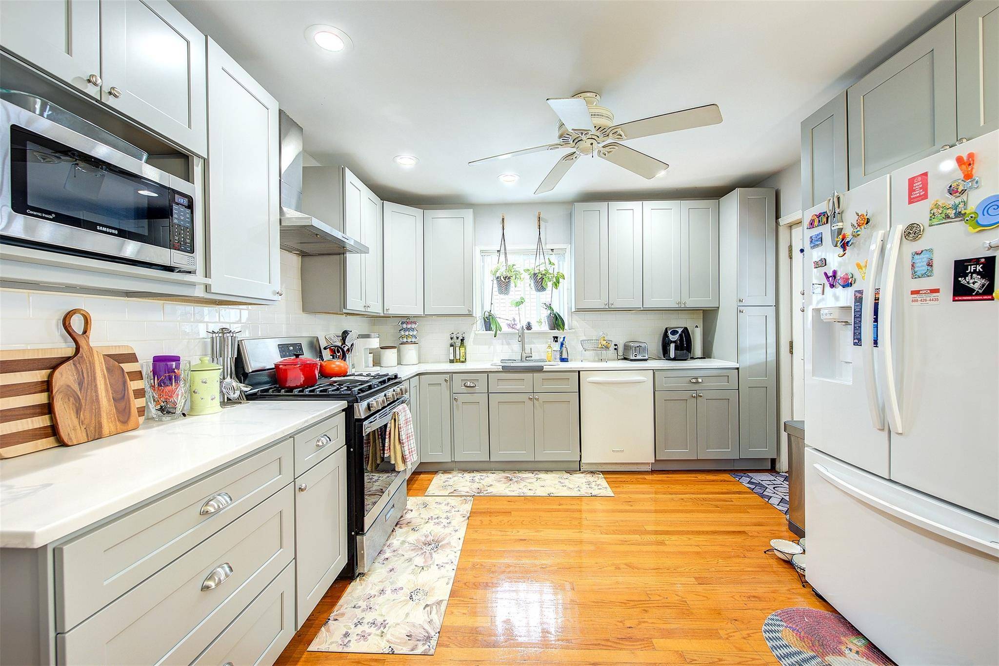Charming single family Semi detached brick home on a 27' x 92' lot with a private driveway and detached garage.