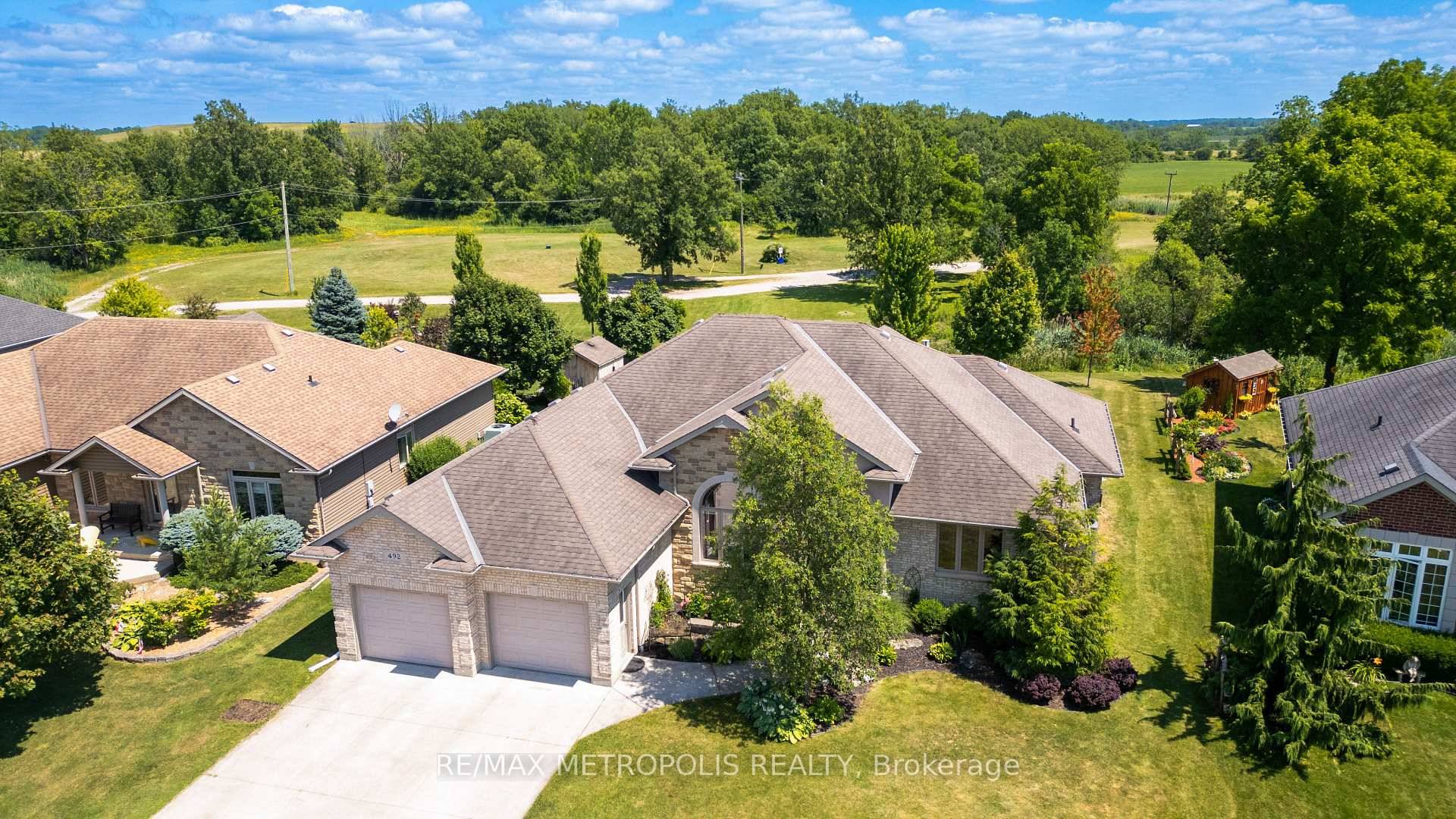 ENJOY THE 19TH HOLE IN THIS BEAUTIFUL BRICK BUNGALOW BACKING ONTO THE 14TH TEE OF THE KINGSWELL GLEN GOLF COURSE NESTLED ON ONE OF PETROLIA, ONT'.