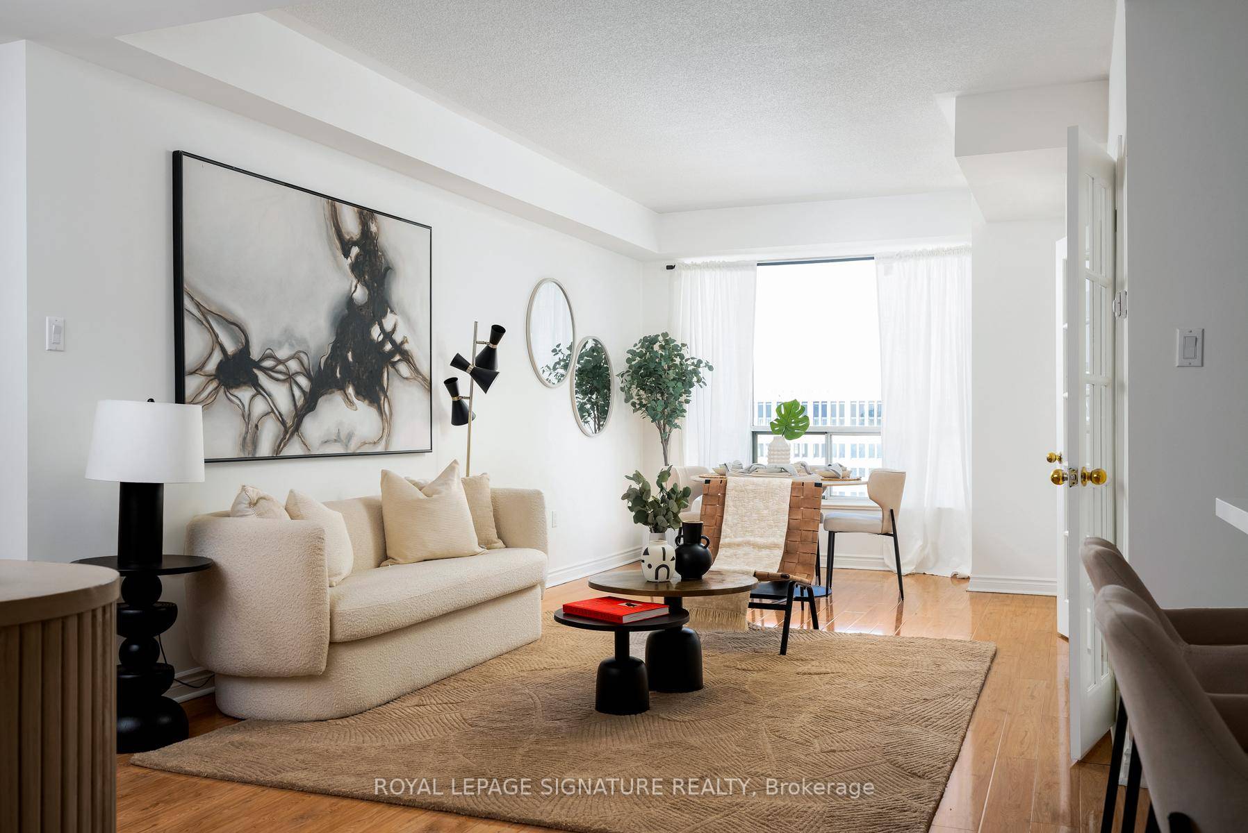 Elevate your lifestyle in this stunning penthouse suite offering approximately 1, 250 sq ft of refined living space.