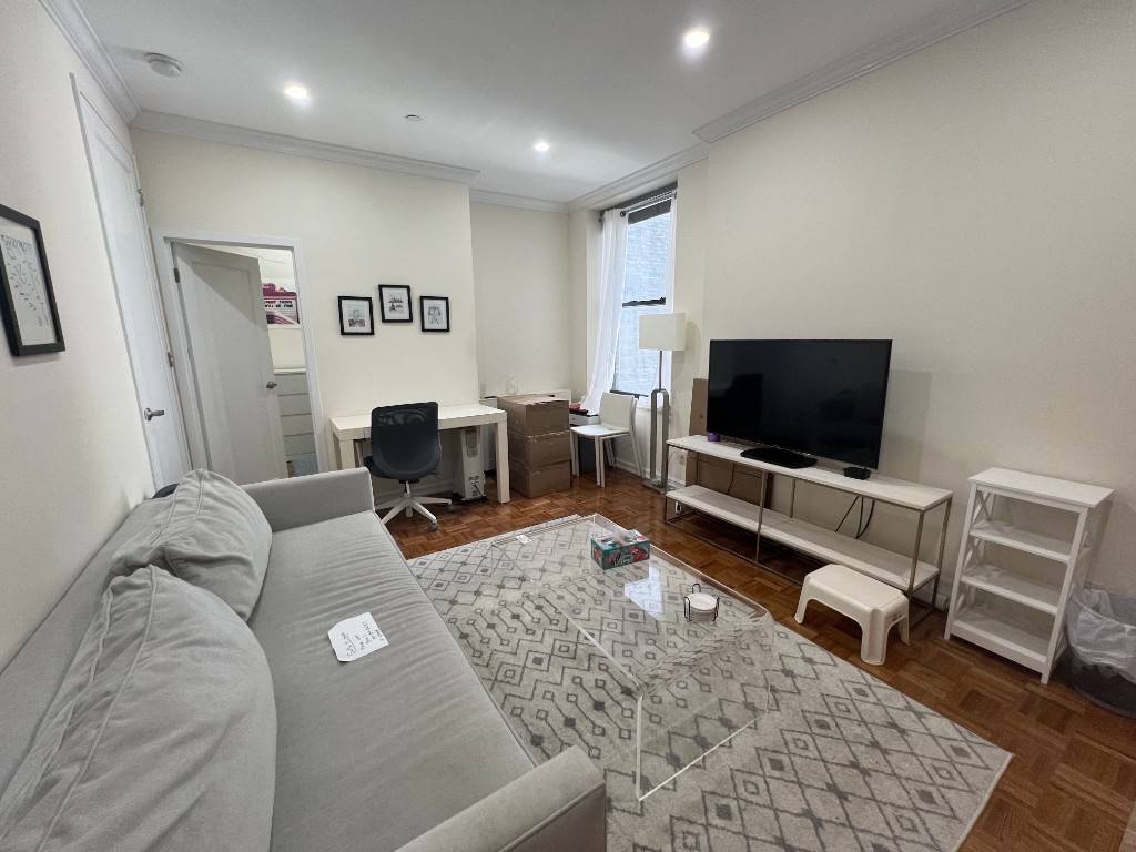 Spacious, quiet renovated 1BR on a tree lined block in a well kept doorman doorman building.