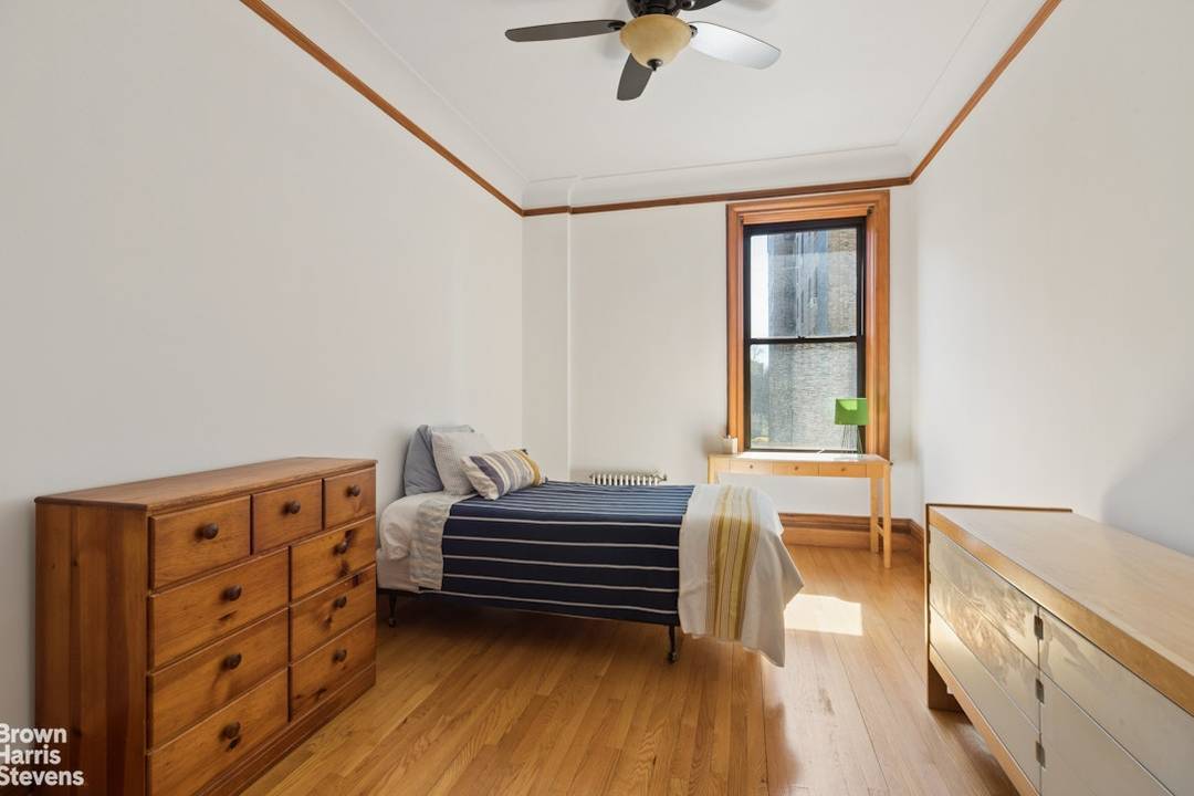 Classic prewar roomy 3 bedroom apartment, with oak floors, French doors, separate regal dining room, numerous deep closets, and direct south and east exposures,.