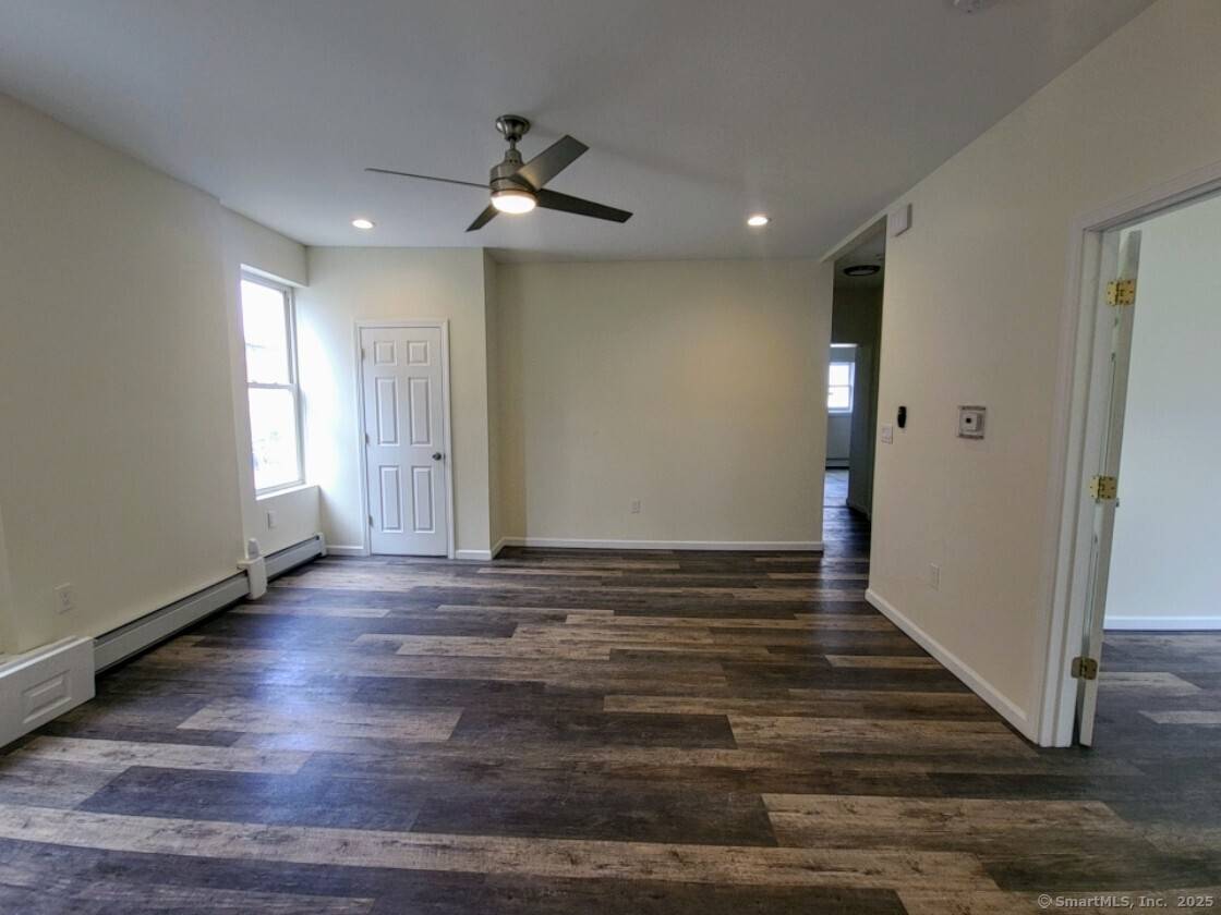 This property offers 3 fully renovated residential units and a commercial style 2 story, heated structure at the back.