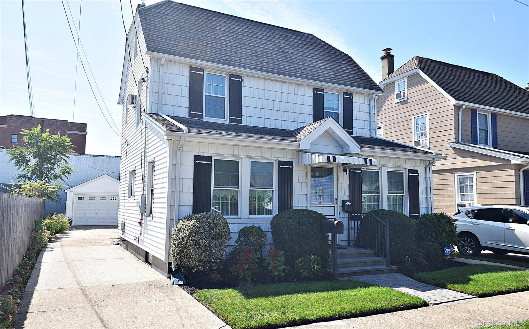 HERRICKS ! ! RARE FIND Don't Miss This Pristine 3 Bedroom 1 Full Bath Colonial Home On A Beautiful Tree Lined Street in the Highly Sought After Herricks School District ...