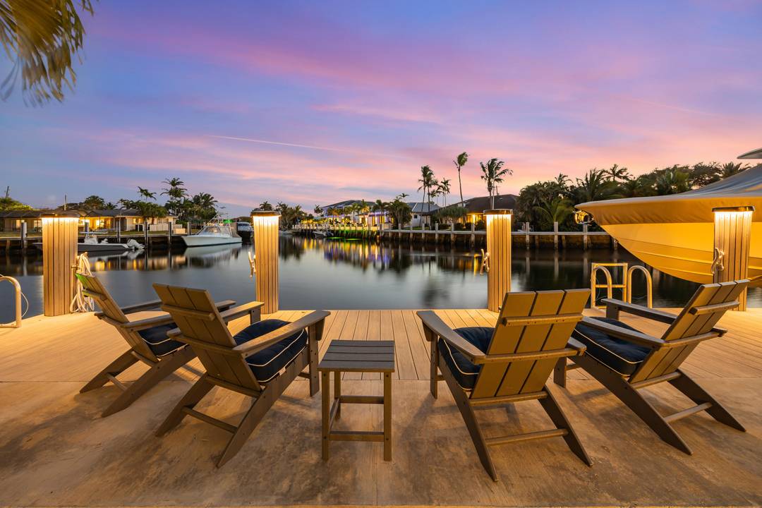 Introducing The Commodore's Boathouse in the desirable Cove enclave of East Deerfield Beach, sited on 90' of deep water frontage with picturesque southern long water views at an intersecting turning ...