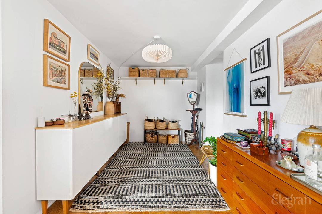 High floor 2 bedroom with southwest facing windows into the expansive living room, setting a warm and inviting tone throughout this beautifully updated home.