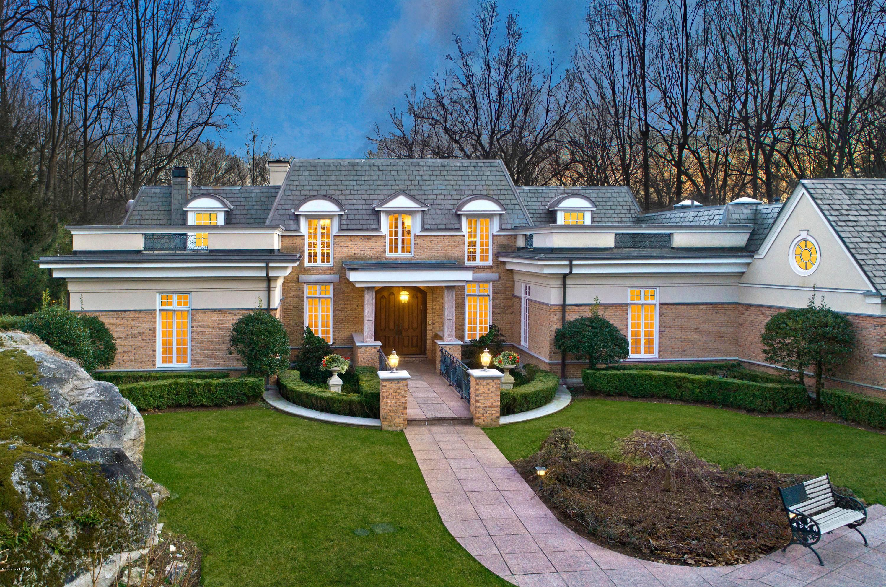 Superb 6 bedroom home set on two beautifully landscaped gated acres showcases a spectacular backyard oasis Stone terraces, pool, tennis court and indoor spa overlooking a lake, provide an idyllic ...