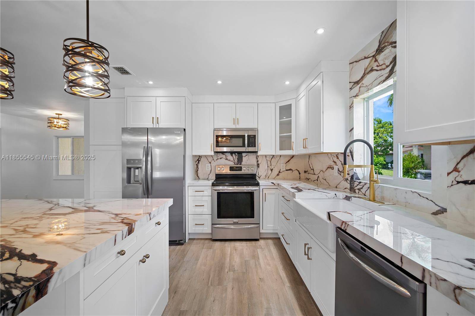 Beautifully renovated 2 bedroom, 2 bath corner lot home in a desirable 55 community in Delray Beach.