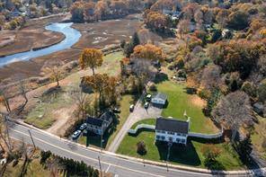 PRICE ADJUSTMENT Welcome home to your new modern and updated colonial, nestled on over 1 2 acre in the heart of Westbrook s shoreline community.