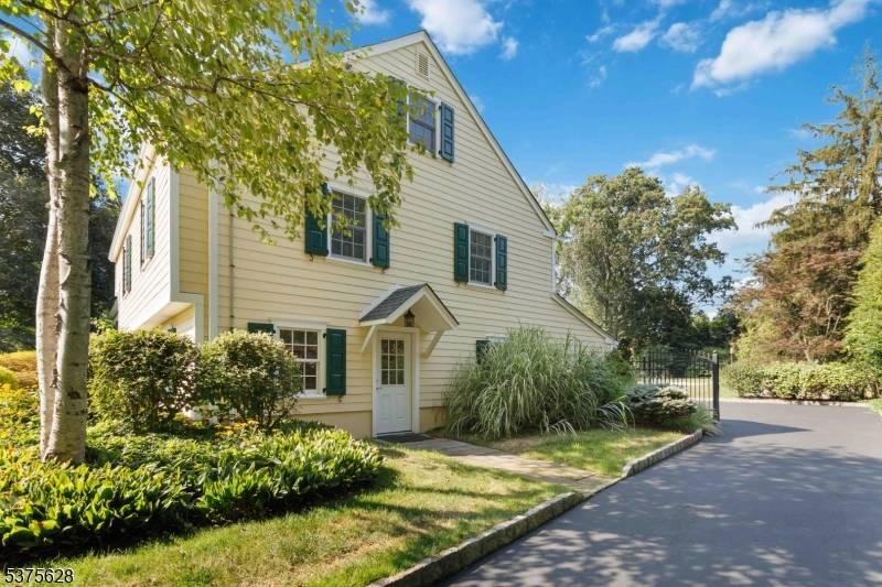 Welcome to 55 May Dr, a charming single family home nestled in the serene neighborhoods of Chatham, NJ.