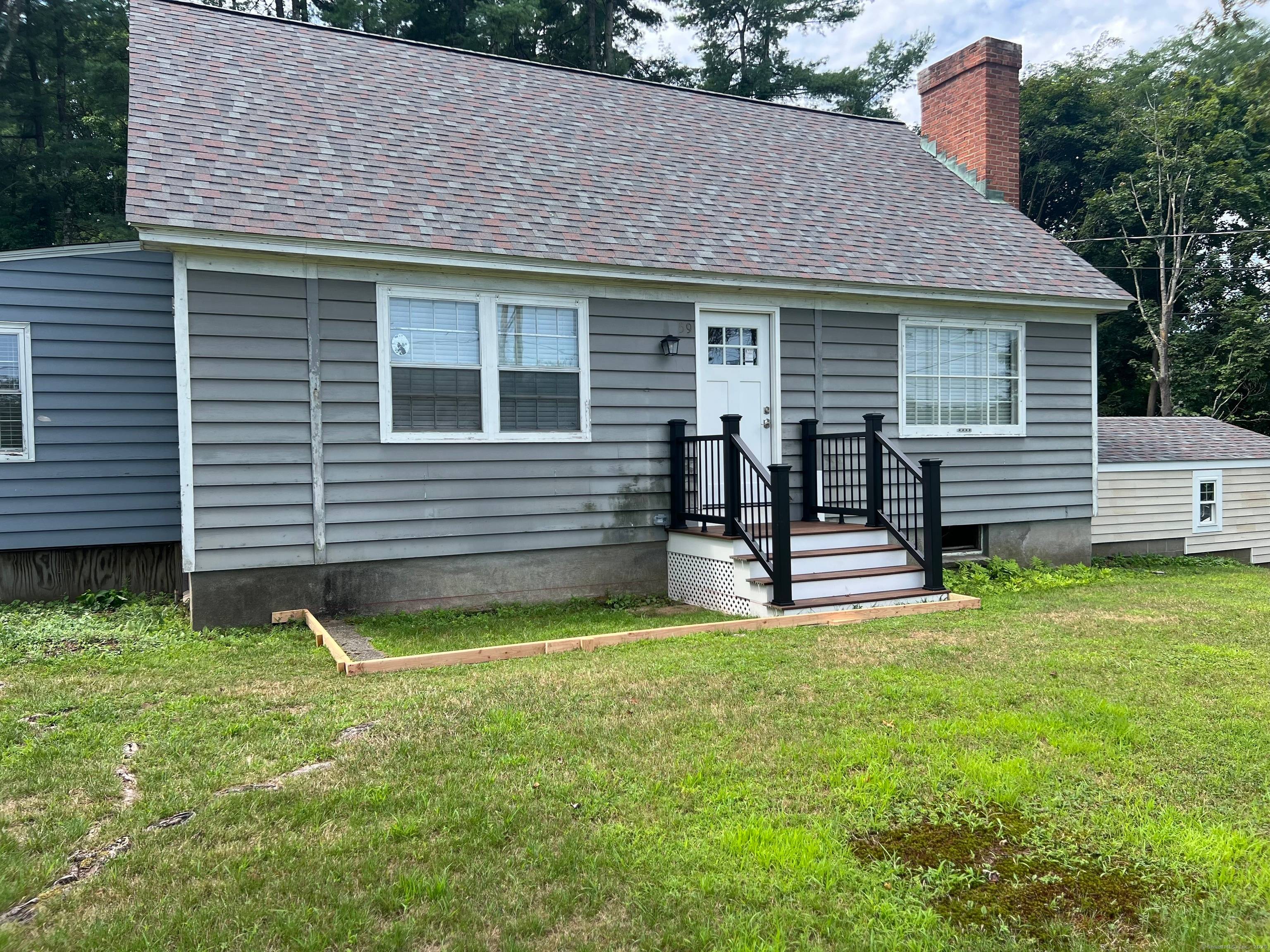 Completely renovated 4 bedroom 2 full bath cape cod home conveniently located right off Main ST.