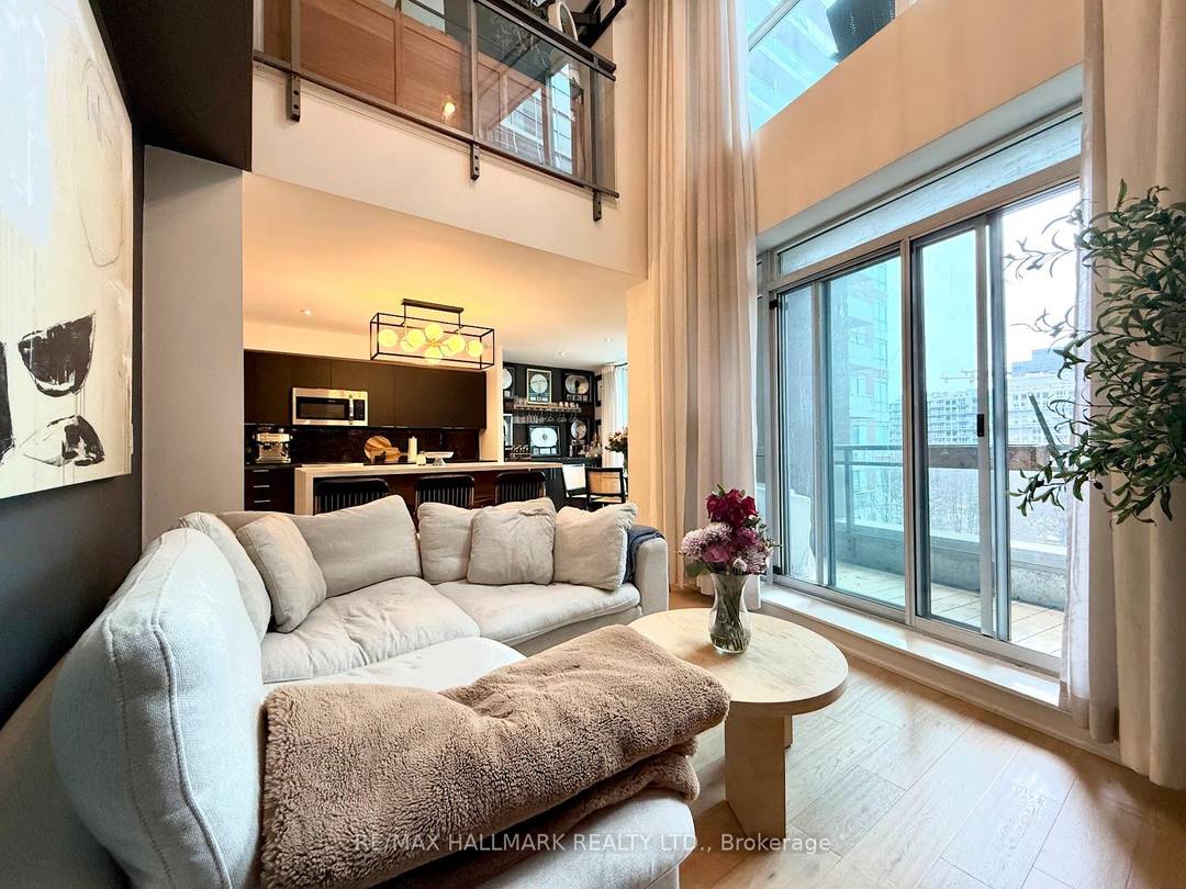 Fully Furnished Rarely Offered Corner Loft in Liberty Village.