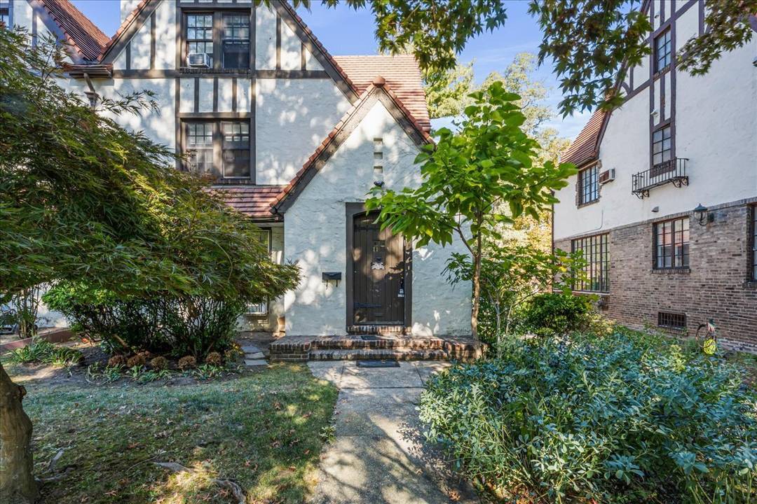 Tudor style home set in the prestigious enclave of Forest Hills Gardens, this 5 bedroom, 3.