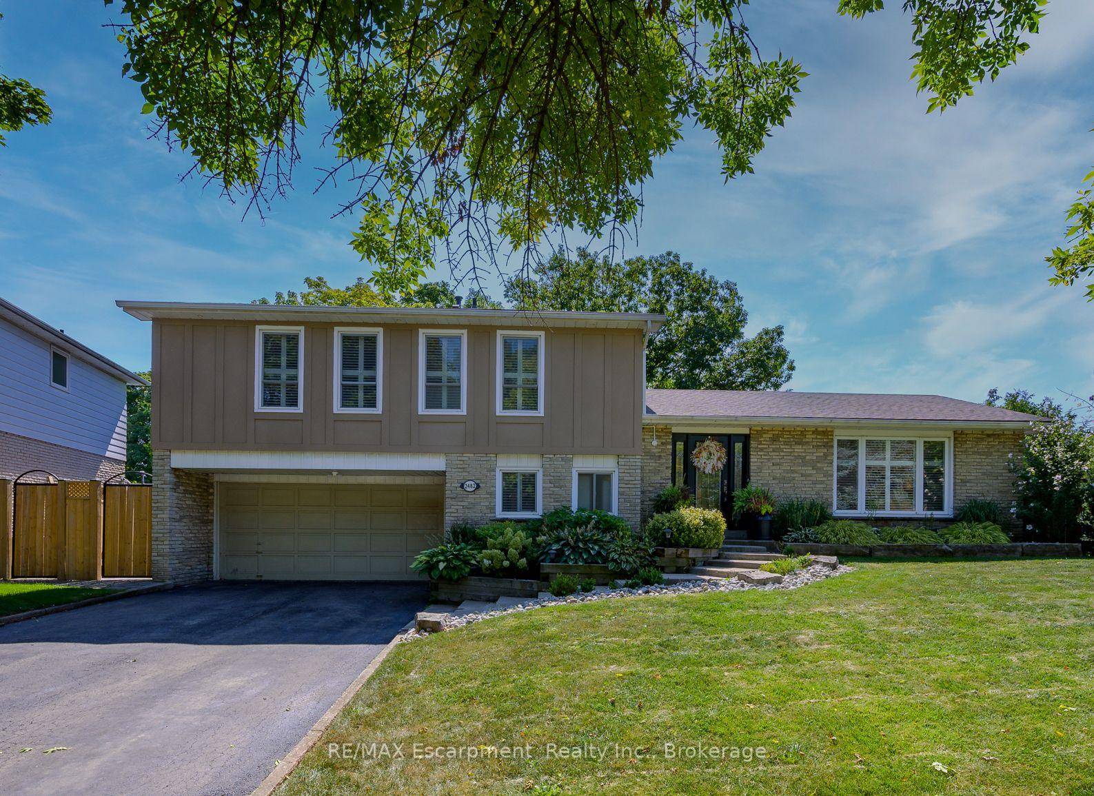 West Oakville Charm with Modern Updates on a Spacious Pie Shaped Lot.
