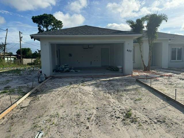 PRICE REDUCED EXQUISITE BNB CONSTRUCTION CUSTOM SINGLE FAMILY CORNER LOT HOME NESTLED IN THE HEART OF PORT ST.