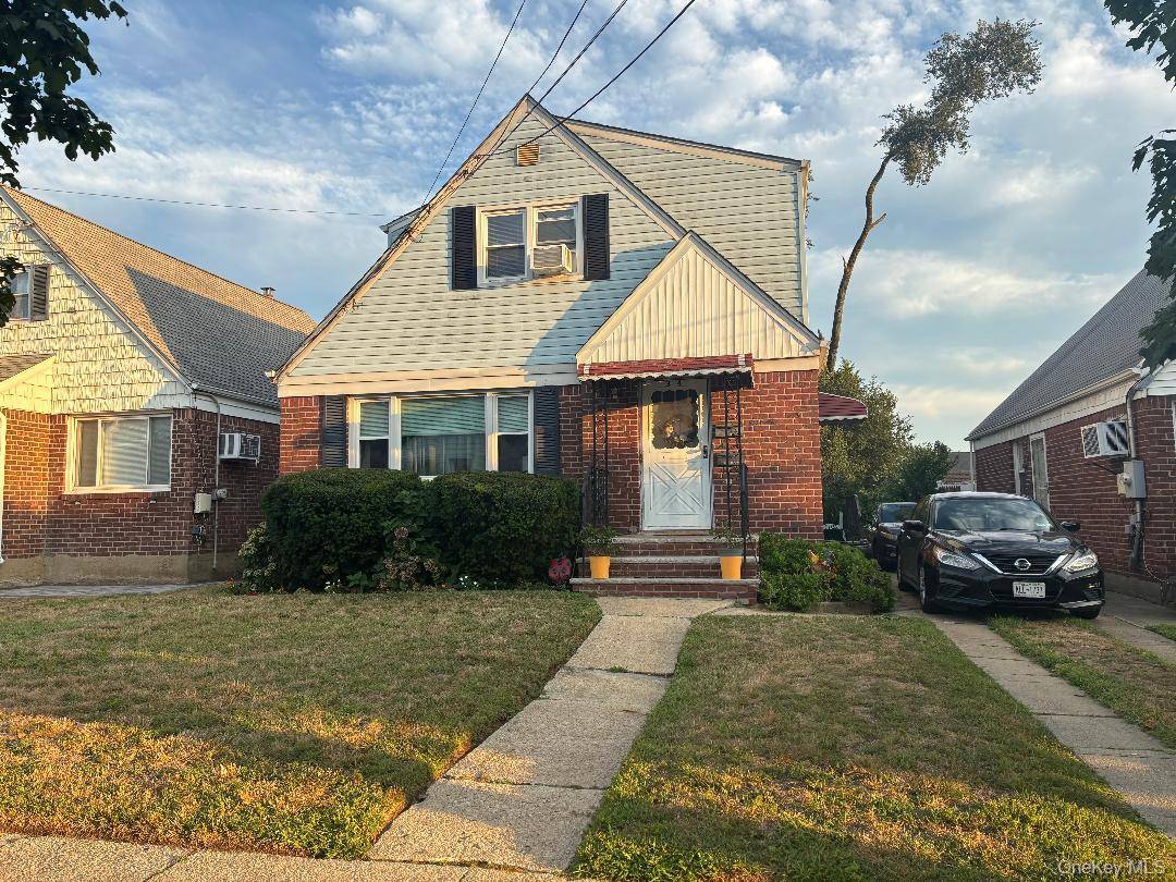 Amazing 2 family home offering 2 generous apartments, each featuring an eat in kitchen, living room, dining room, and 2 bedrooms.