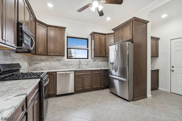 Nestled in a charming neighborhood, this exquisite Victorian home combines the grace and elegance of a bygone era with modern comforts and amenities.