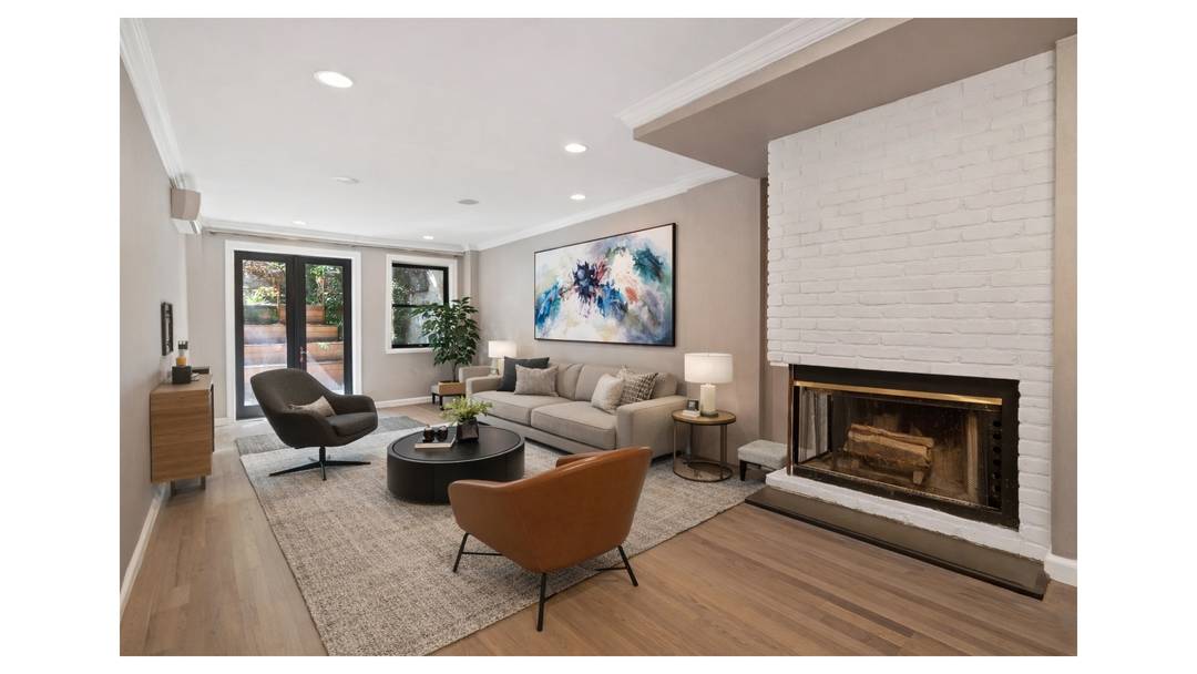 Welcome to a delightful oasis at 332 West 19th Street, nestled in the vibrant heart of a lively neighborhood !