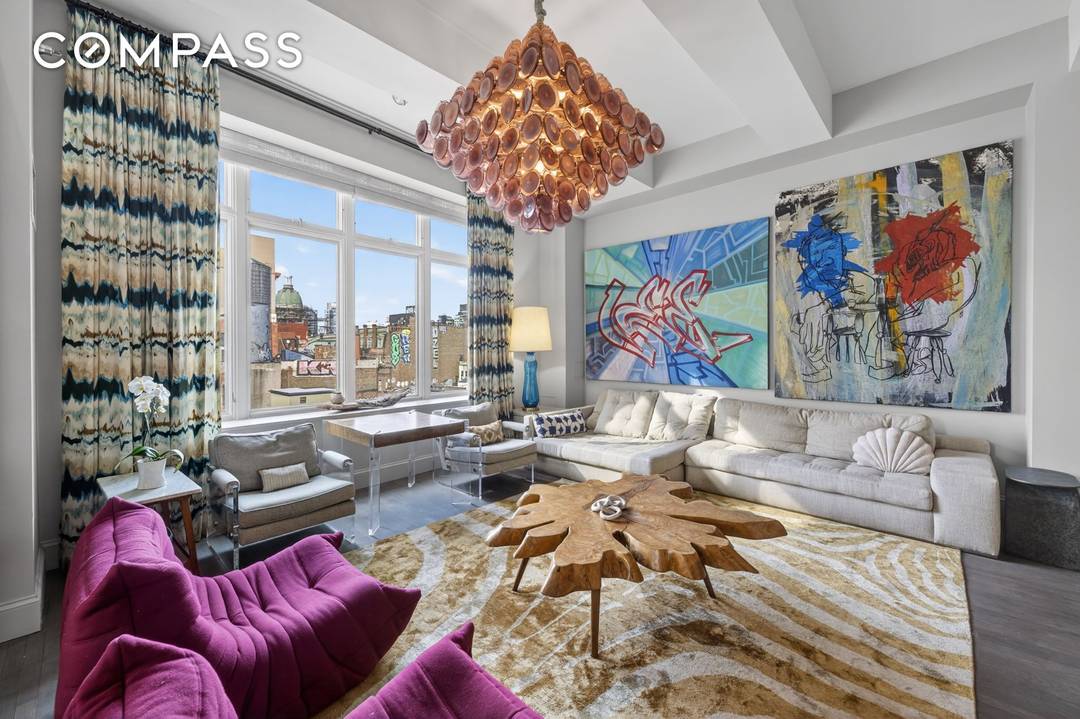 A True Downtown Loft A true downtown loft with an artistic sensibility, this expansive residence is defined by 12 foot beamed ceilings, hardwood floors, and a scale rarely achieved today.