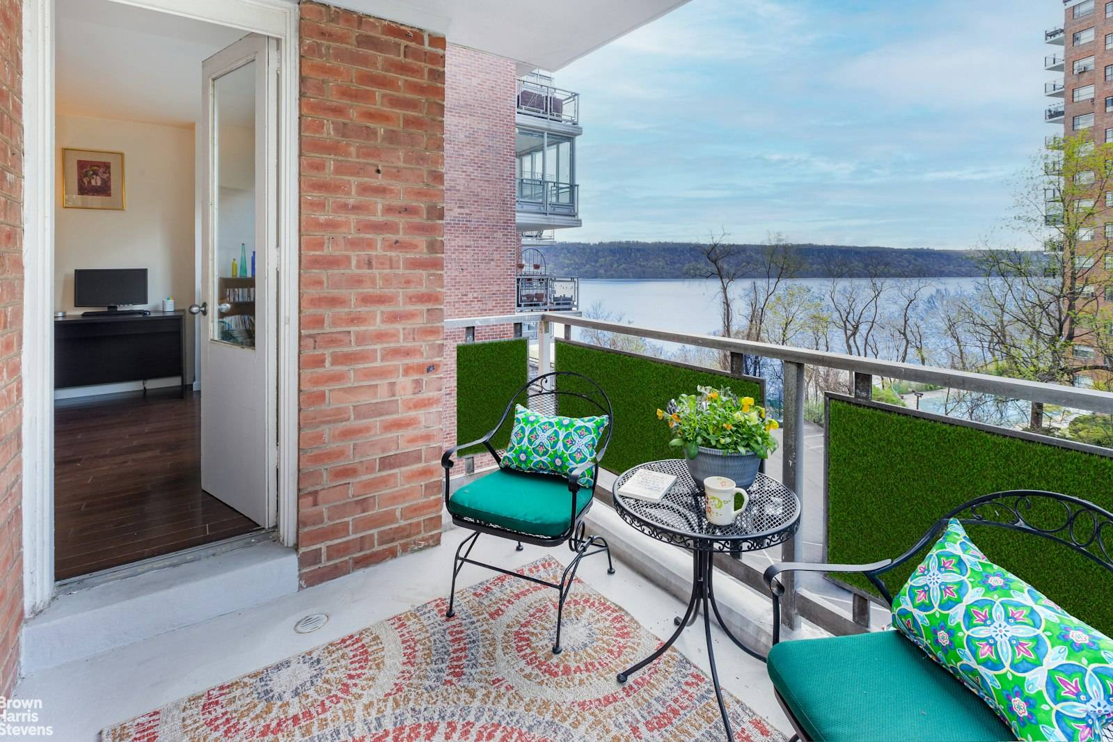 A rarely available corner apartment built on a hillside, this second floor unit is six stories above the Hudson River.
