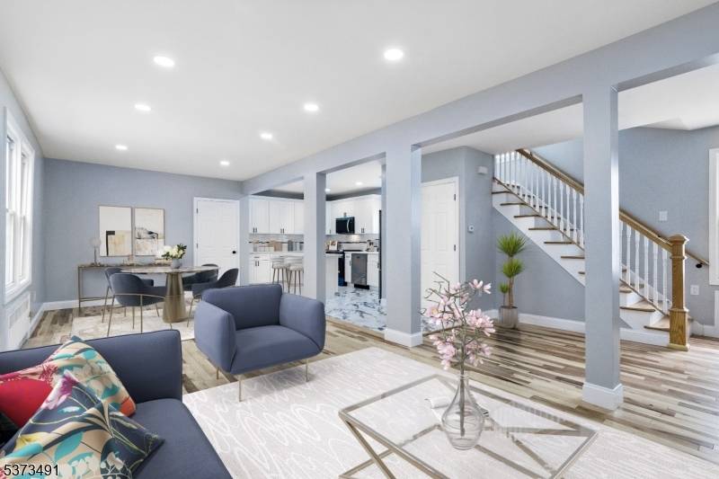 Welcome to this beautifully updated residence in the vibrant Vailsburg section of Newark.