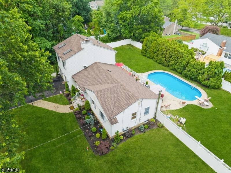 Welcome to this spacious home in the heart of Scotch Plains located on a very desirable street.