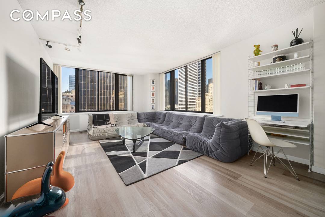 Experience the pinnacle of Manhattan living at 445 5th Avenue, Apt 21A, a premier one bedroom residence perfectly situated in Midtown South, just steps from the lush greenery of Bryant ...