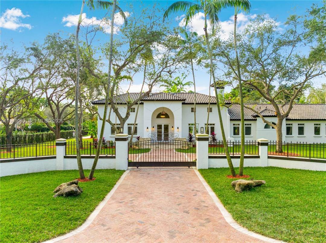 Your private oasis on a highly coveted corner lot awaits !