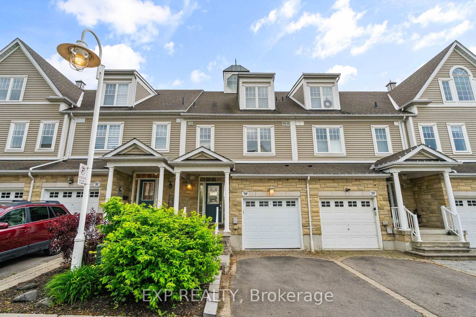 Wake up to the shimmer of lake views and end your days with breathtaking sunsets in this executive 3 bedroom freehold townhome, perfectly nestled in Pickerings sought after Nautical Village.
