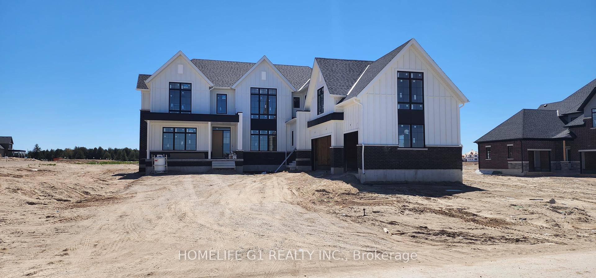 Taxes yet to be assessed Assignment Sale Discover this stunning estate home featuring 7 spacious bedrooms, each with its own full ensuite and a total of 8 bathrooms.