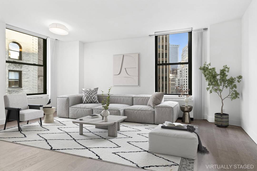 Two Bedroom, Two Bathroom Condo Experience urban elegance at The Broad Exchange Building.