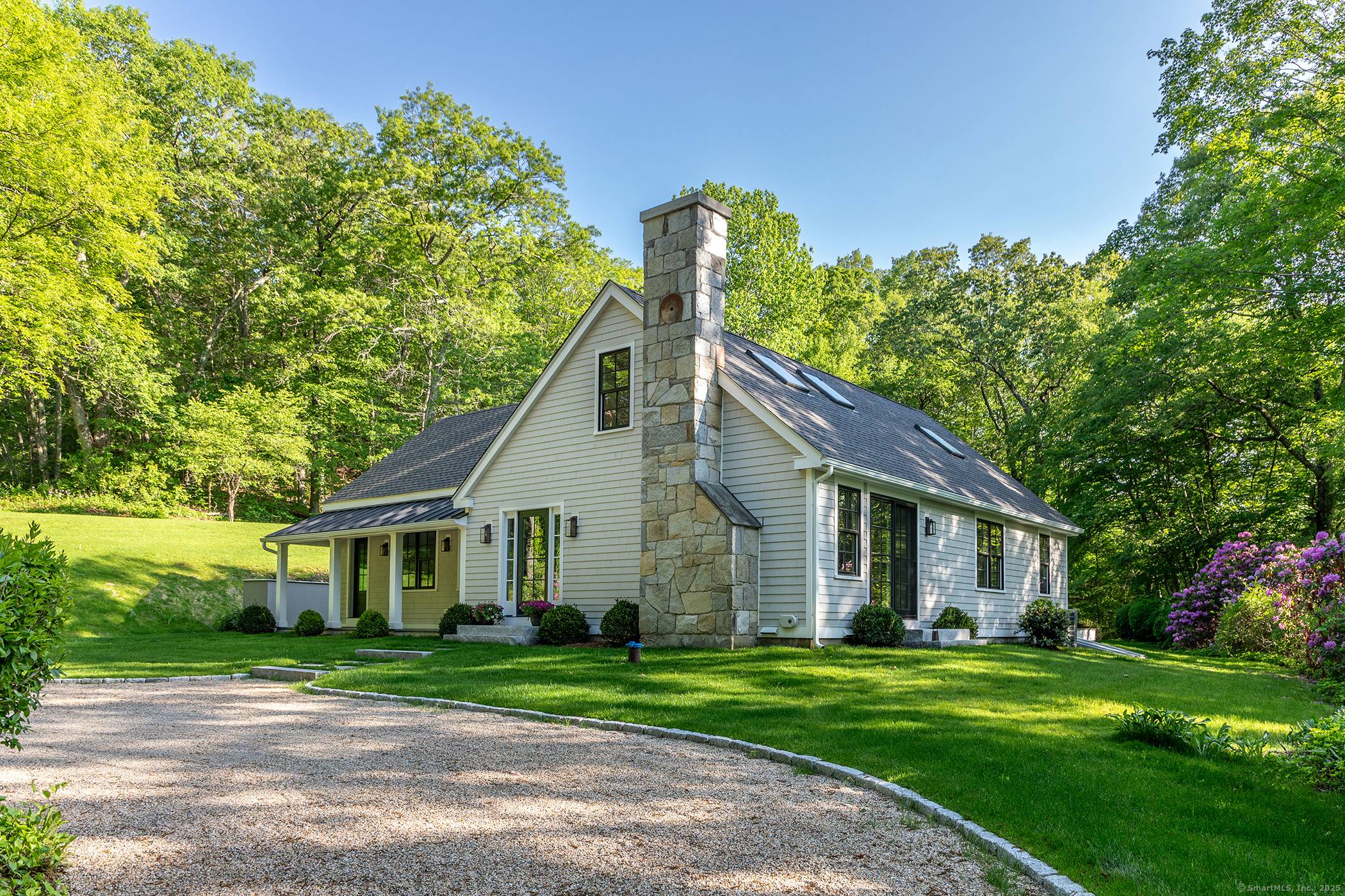 Mint move in ready ! Superbly designed and beautifully built Nantucket shingle style cape on a large private lot, nestled in coveted Washington.