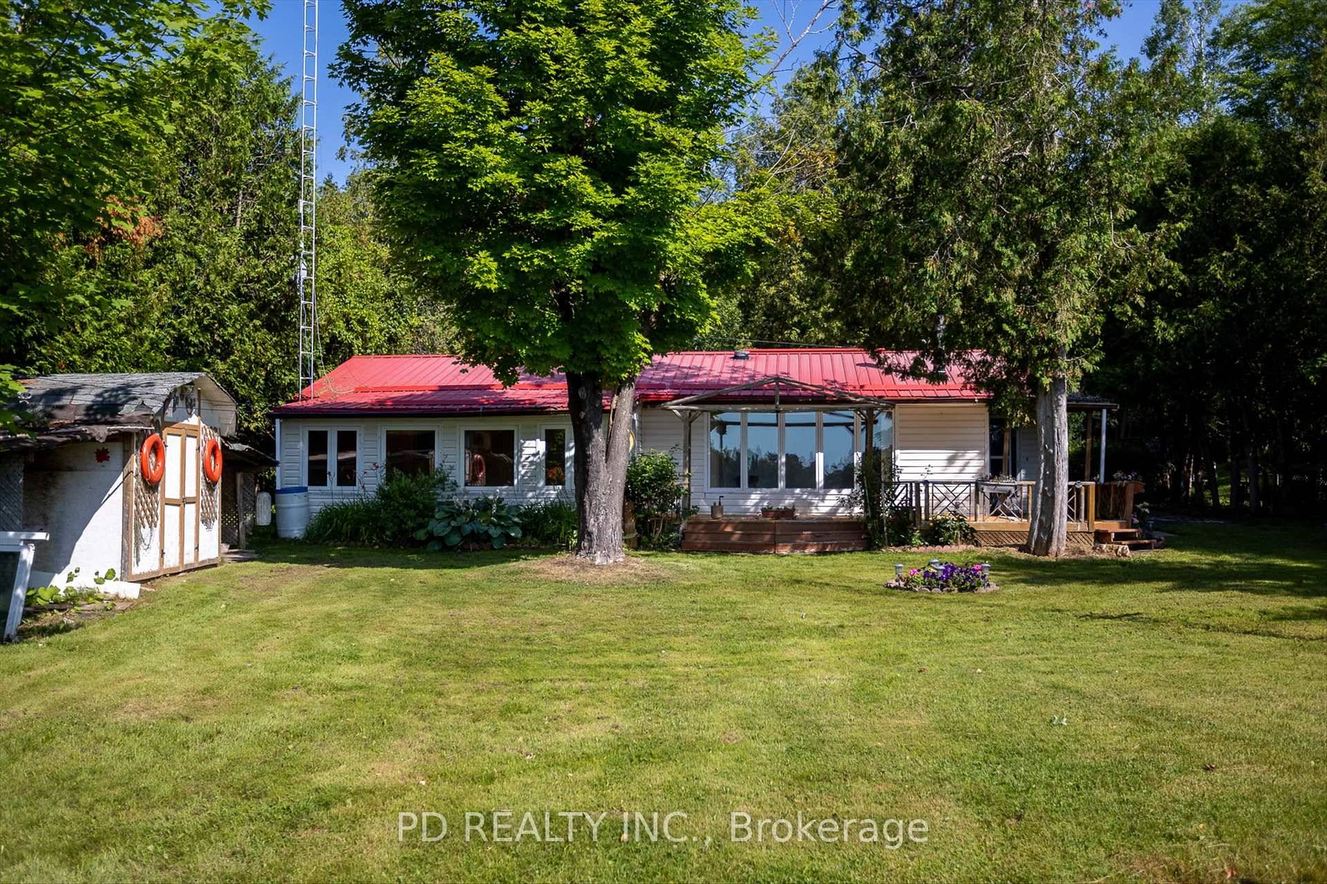 Welcome to this cozy 2 bedroom, 1 bathroom bungalow nestled on a quiet private year round road with 80 feet of waterfront on Pigeon Lake.