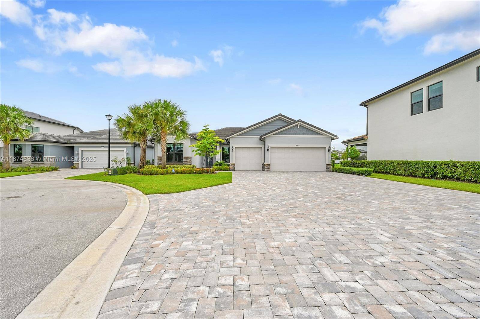 Model row lakefront stunner in SOLD OUT Oak Tree gated, 2024, and loaded with premium upgrades.