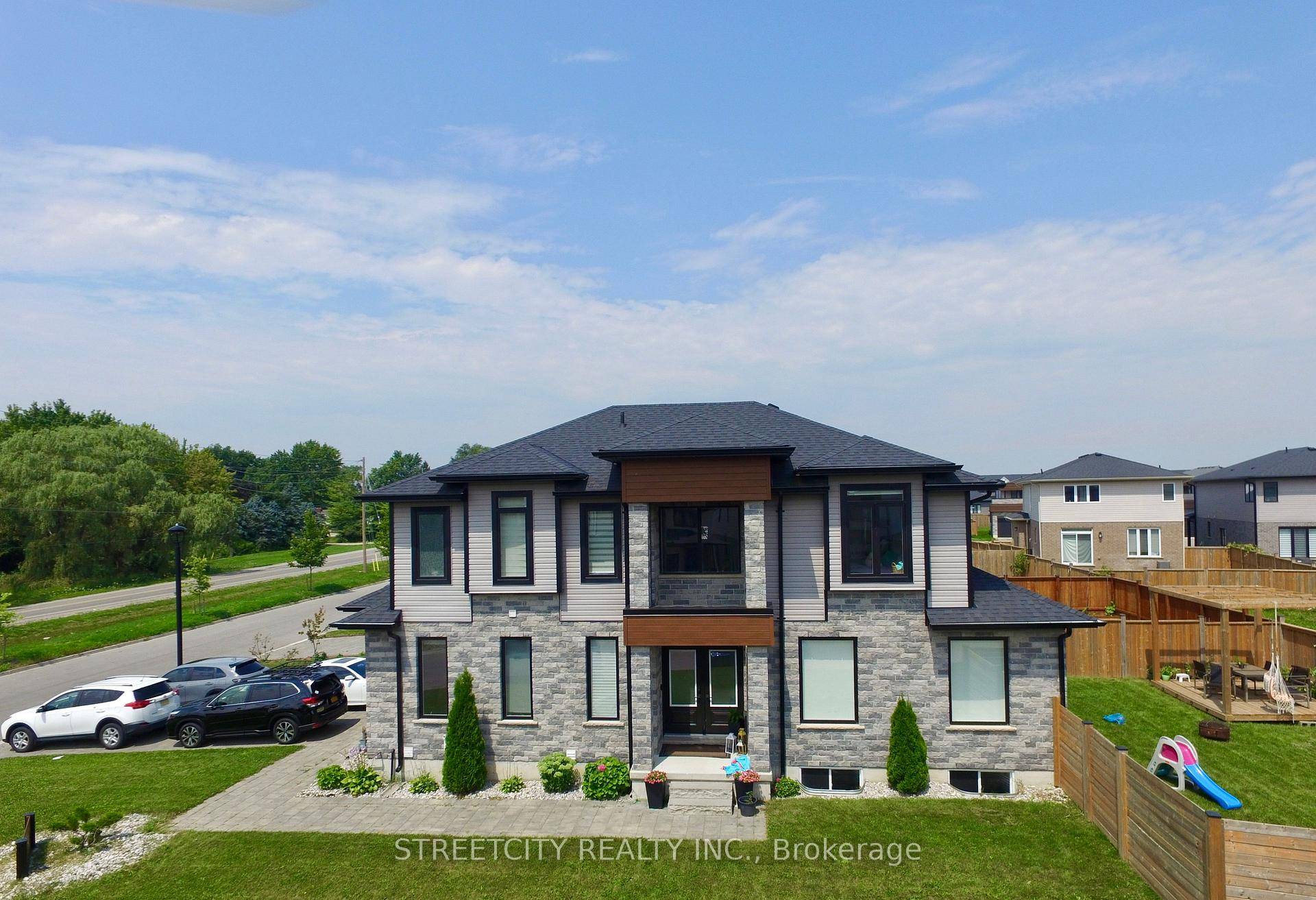 Welcome to this beautifully designed 2 storey modern home in a quiet, family friendly neighborhood in North London.