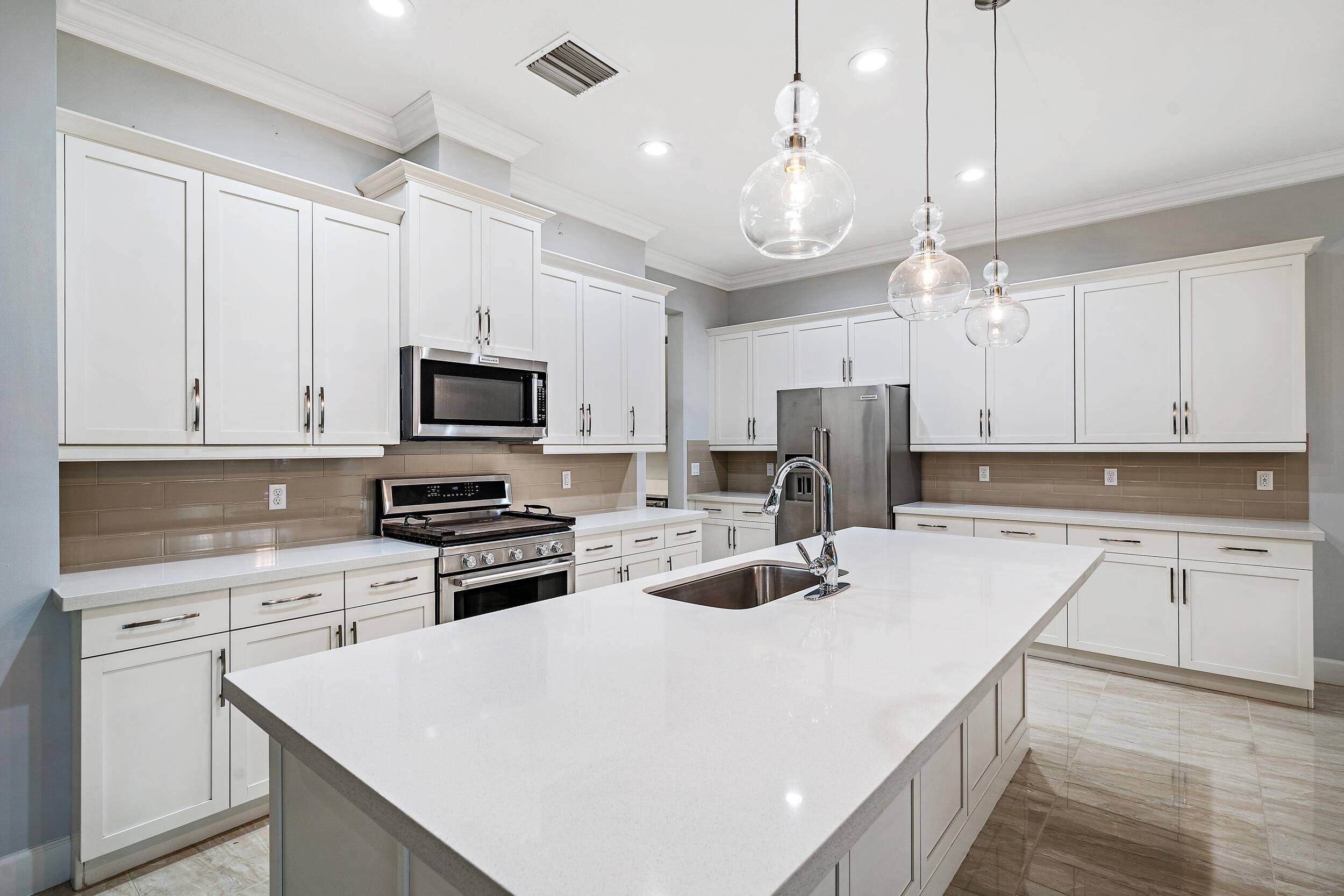 Rarely available, newer construction home 2018 in West Lake Worth's best kept secret community of Andalucia.