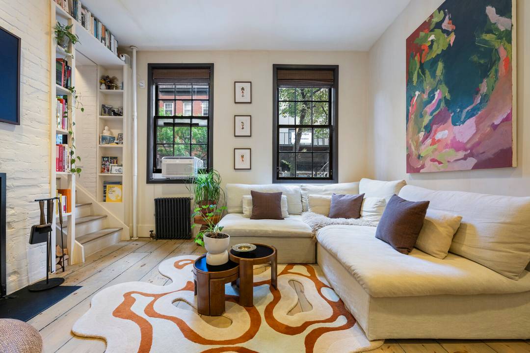 Charming Triplex Co op with Townhouse Feel in Prime Downtown Location This rare multi level co op combines the charm of townhouse living with modern comforts, perfectly situated at the ...