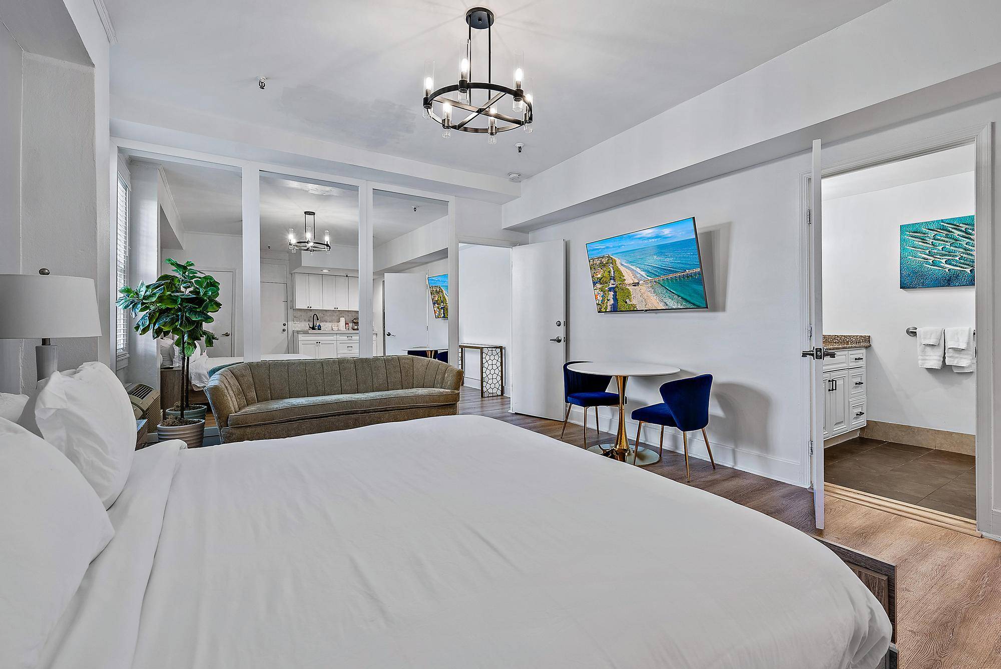 Enjoy serene poolside views from the comfort of your own luxurious space.