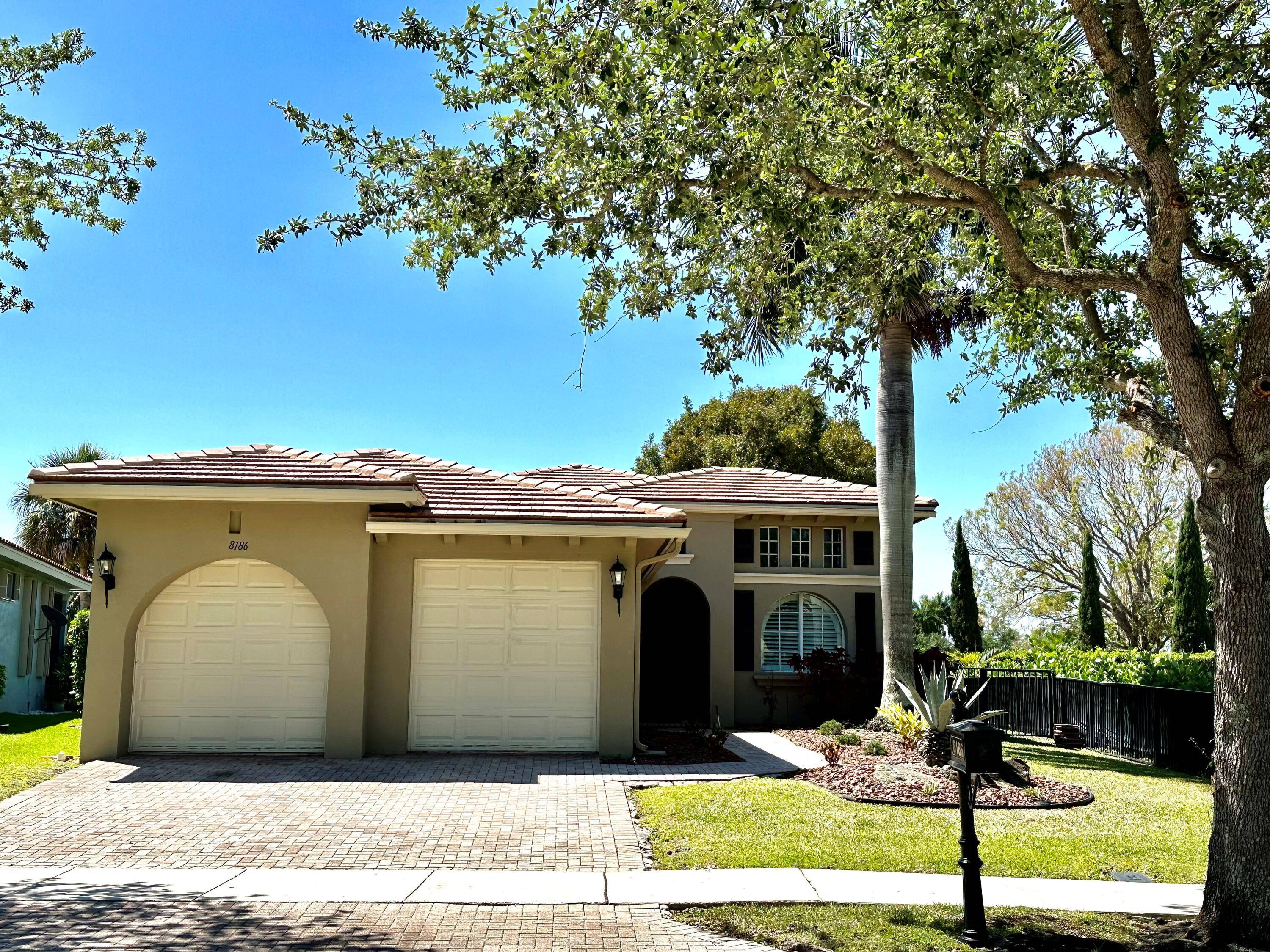 Live the Heron Bay Lifestyle Here in This Warm and Inviting 3 Beds 2 Baths Home w Endless Lake Views !