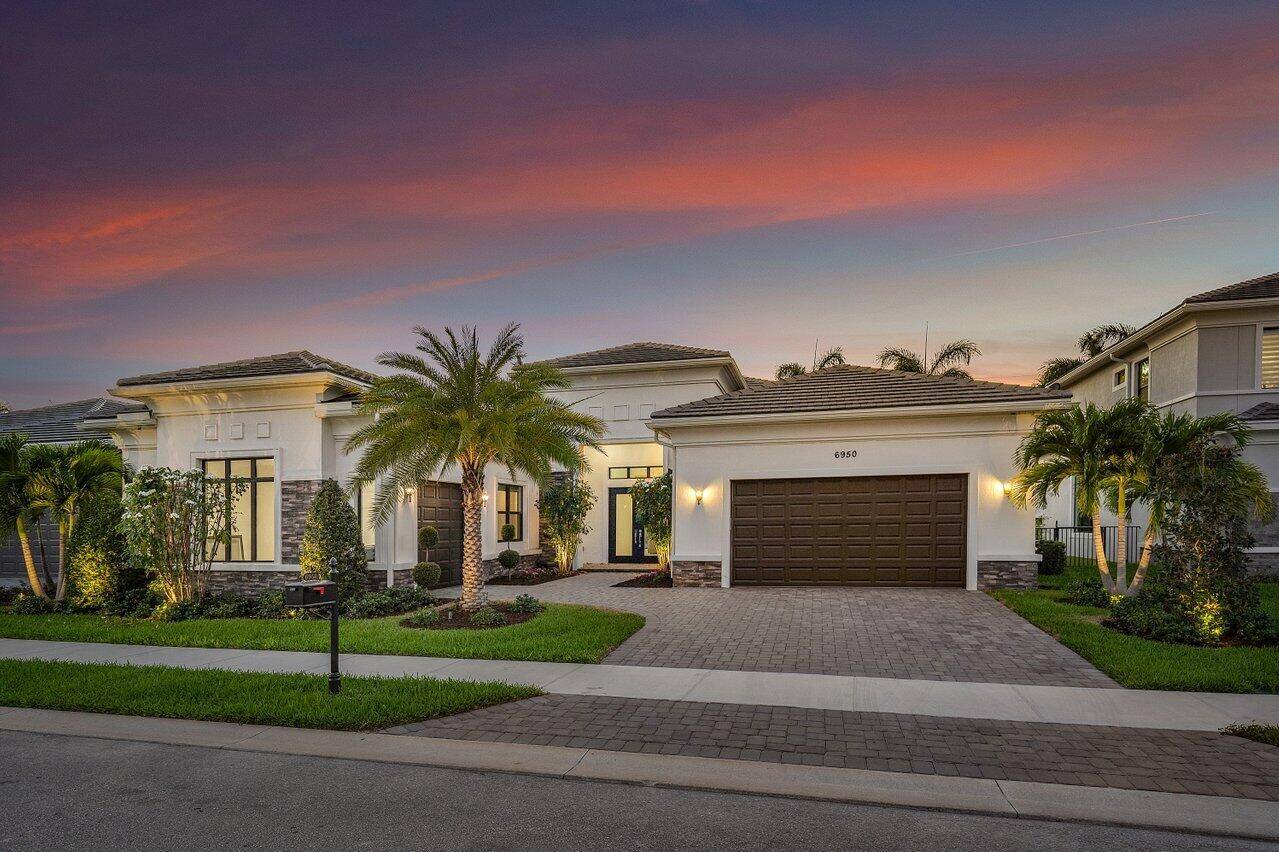 San Giorgio 1 story home with 4 bedrooms Office located in desirable Royal Palm Polo.