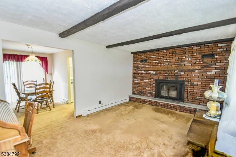 WOW ! ! SPECTACULAR EXPANDED 4 BEDROOM CAPE COD ON A QUIET DEAD END STREET.